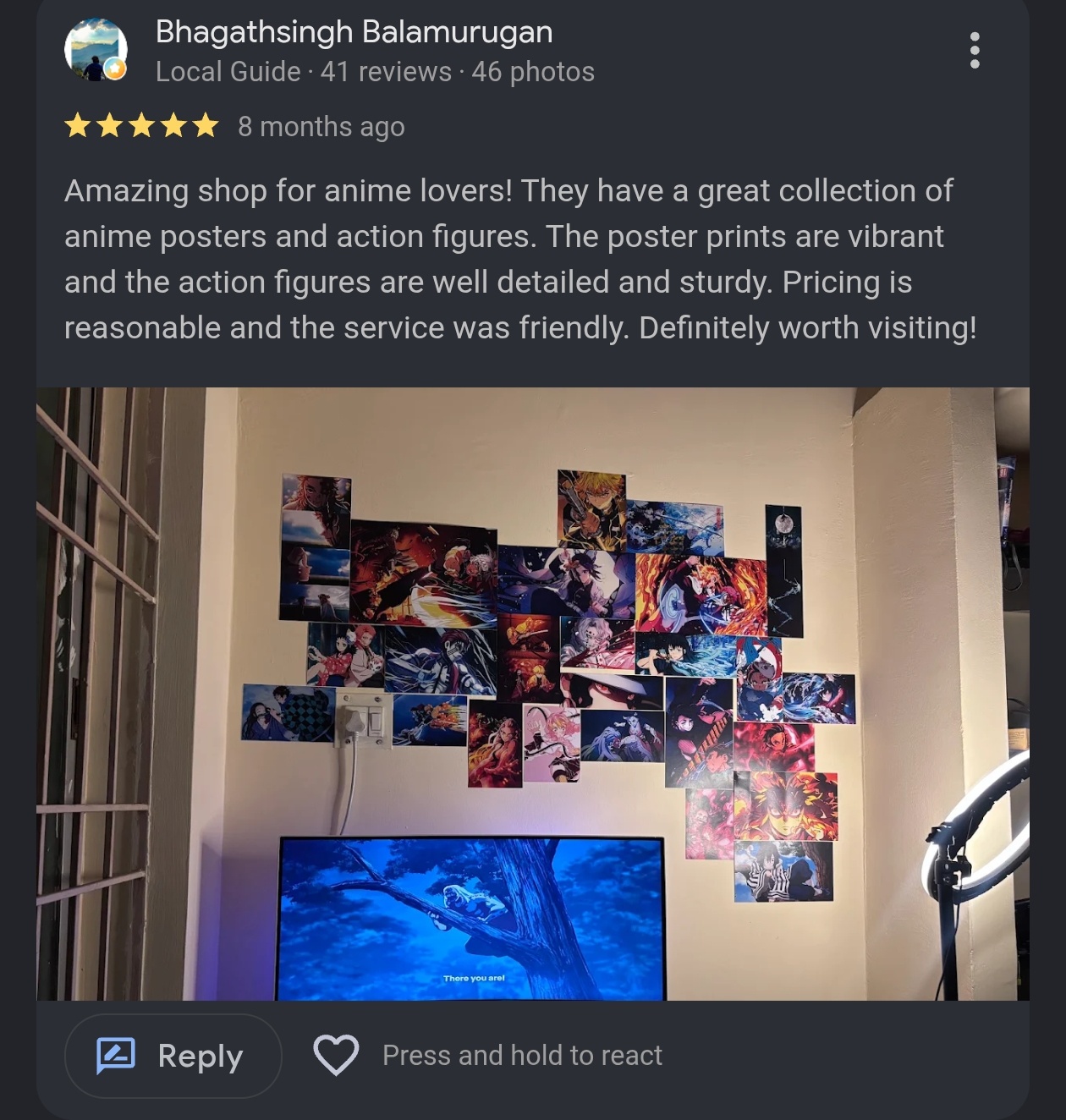 Google review by Bhagathsingh Balamurugan, Local Guide, showing an anime poster wall